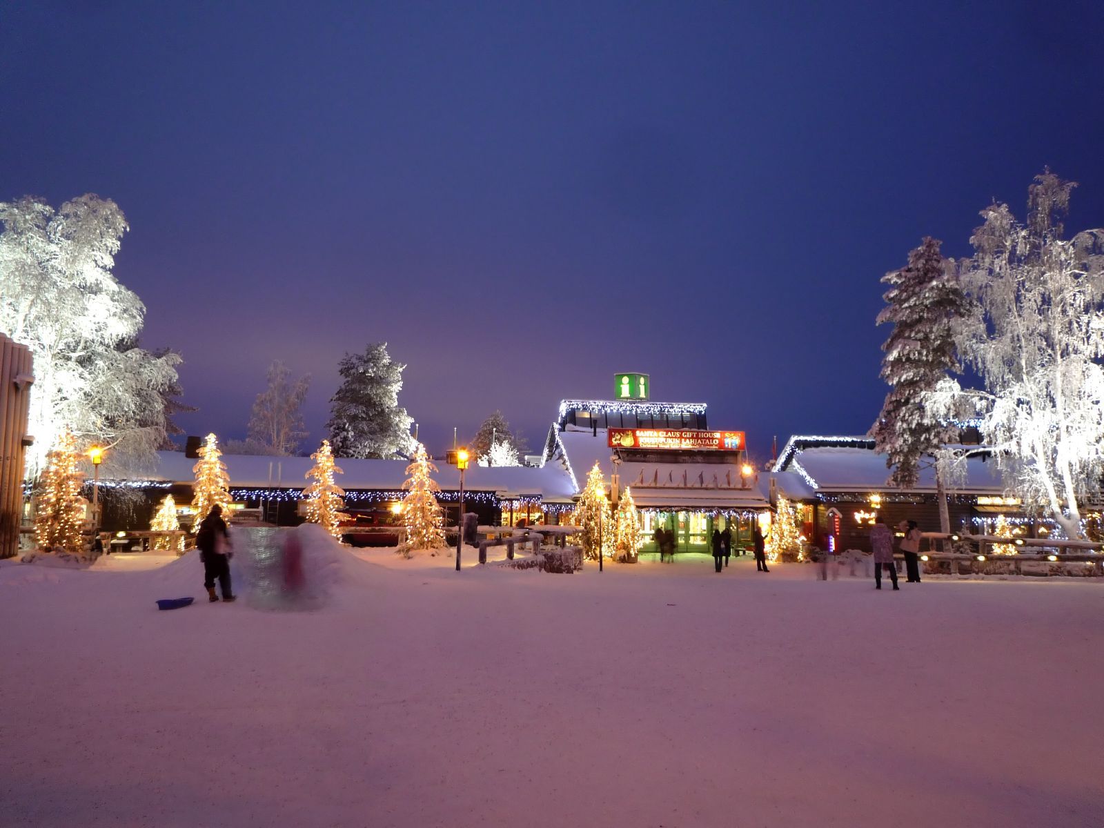Santa Claus Village in Rovaniemi in winter, lit up at dusk