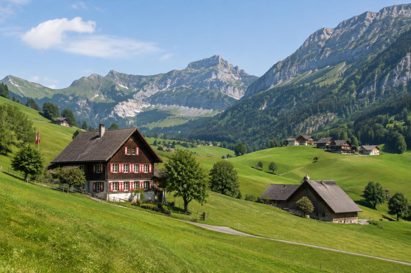 Appenzell farmhouses and green hills below the Alpstein