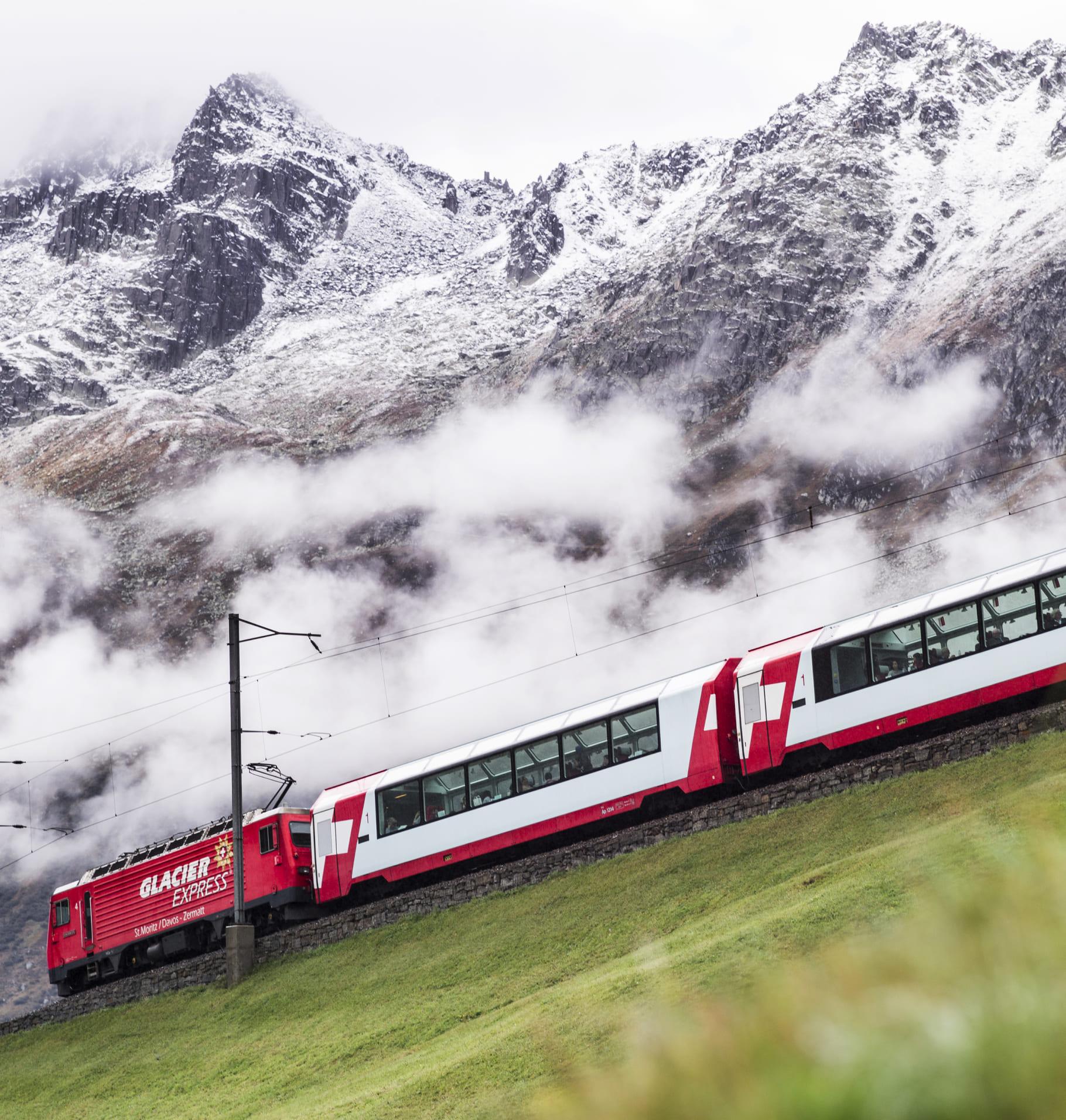 Glacier Express train through the snowy Alps